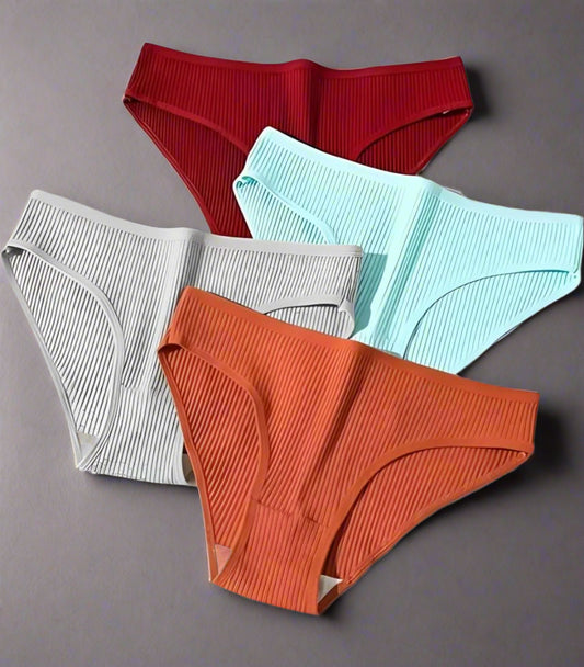 Four pairs of ribbed underwear in red, gray, blue, and orange on a white background.